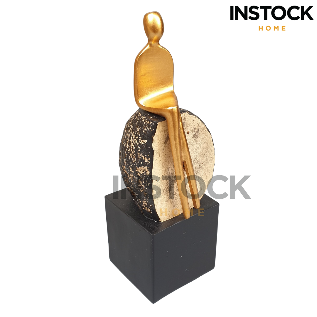 Resin Statue On Rock